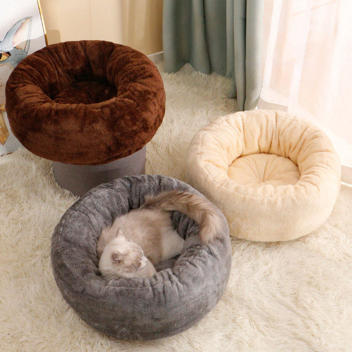 Why Your Pet Deserves the Best: The Long Plush Donut Round Bed